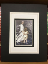 Load image into Gallery viewer, Jesus and little child walking on the water together in a bad storm. A matted print illustrated by artist Suzanne Davis Harden. The triple Matt is black and cream colored and white and is 8 inch by 10 inches