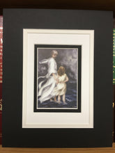 Load image into Gallery viewer, Jesus and little child walking on the water together in a bad storm.  A  matted print illustrated by artist Suzanne Davis Harden. The  triple Matt is black and cream colored and white and is 8 inch by 10 inches 
